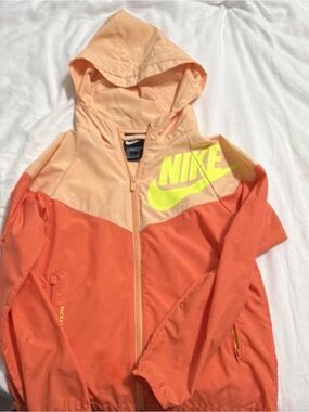Nike Kids Peach and Coral Colorblock Rain Jacket with Neon Logo